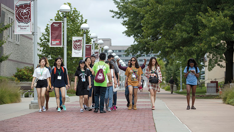 A young group of students visiting MSU